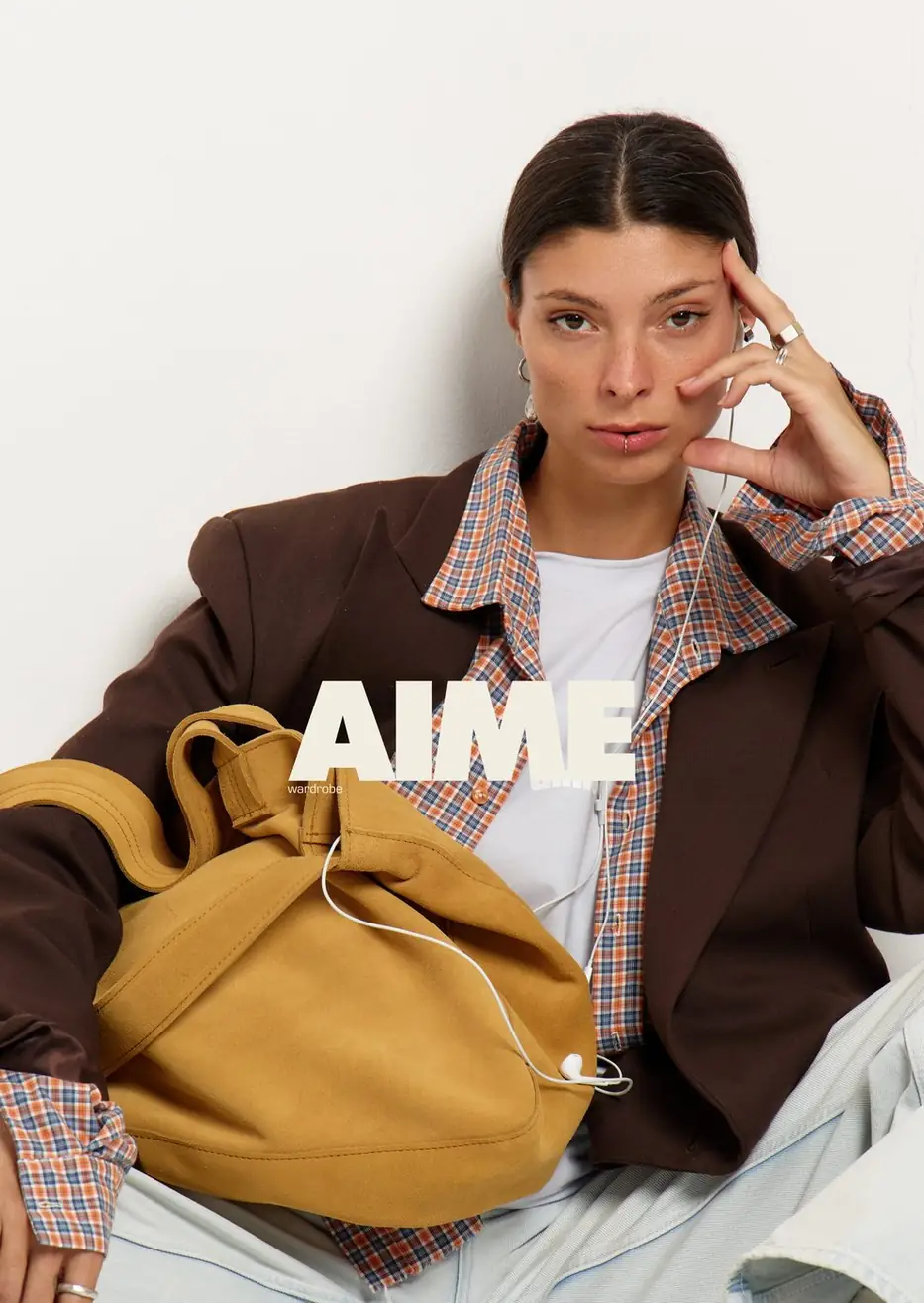 The aime wardrobe cover, suede bag carried