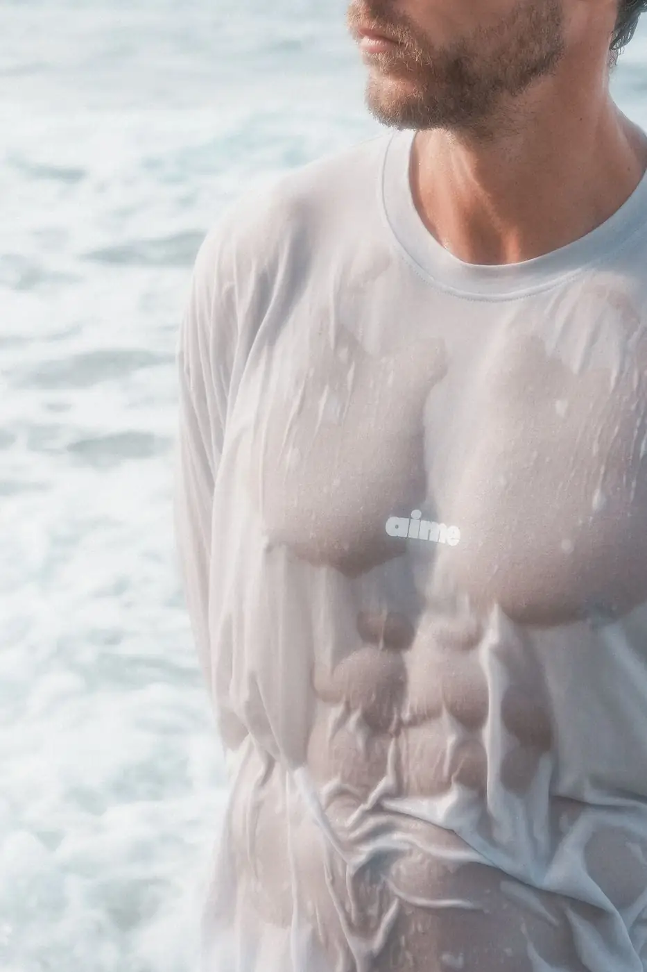 Wet aime tee in the waves